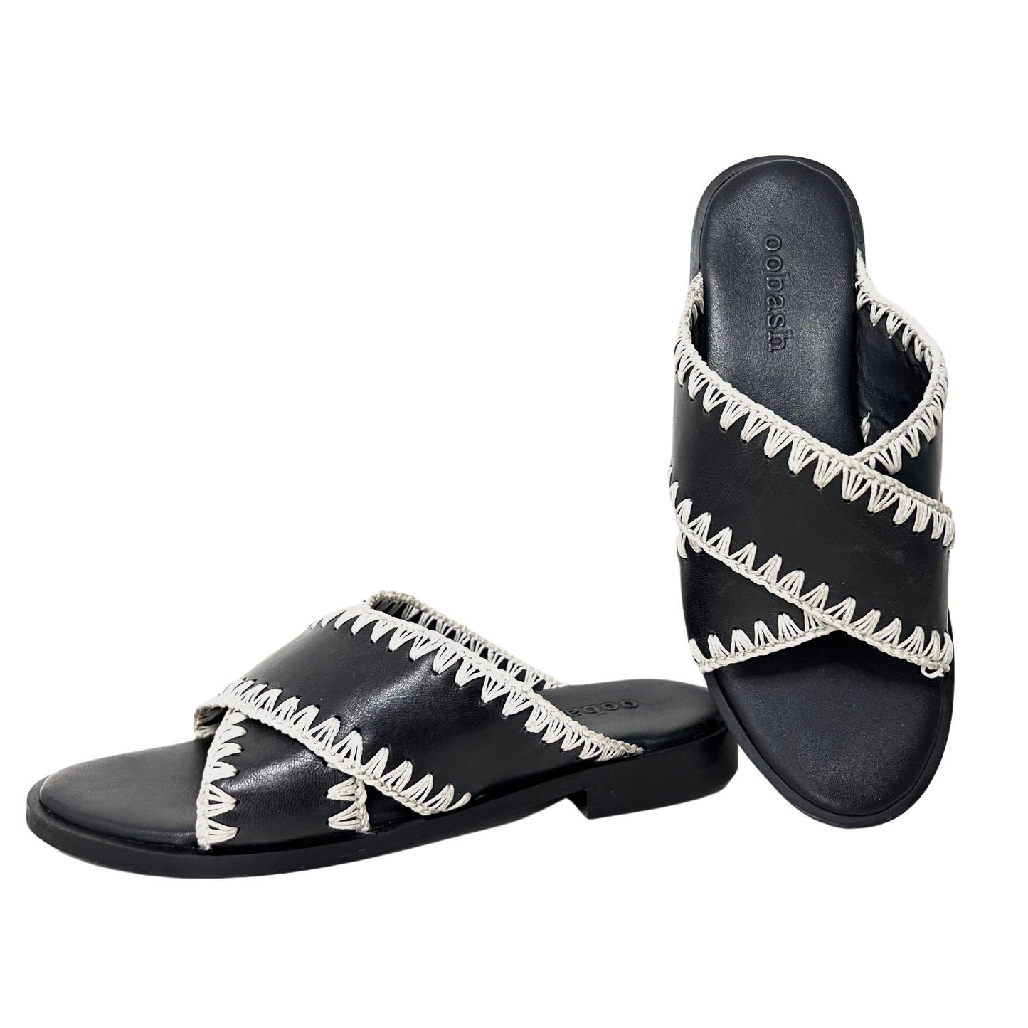 handweaved thread on a classic crossover strap ladies sandal in black color
