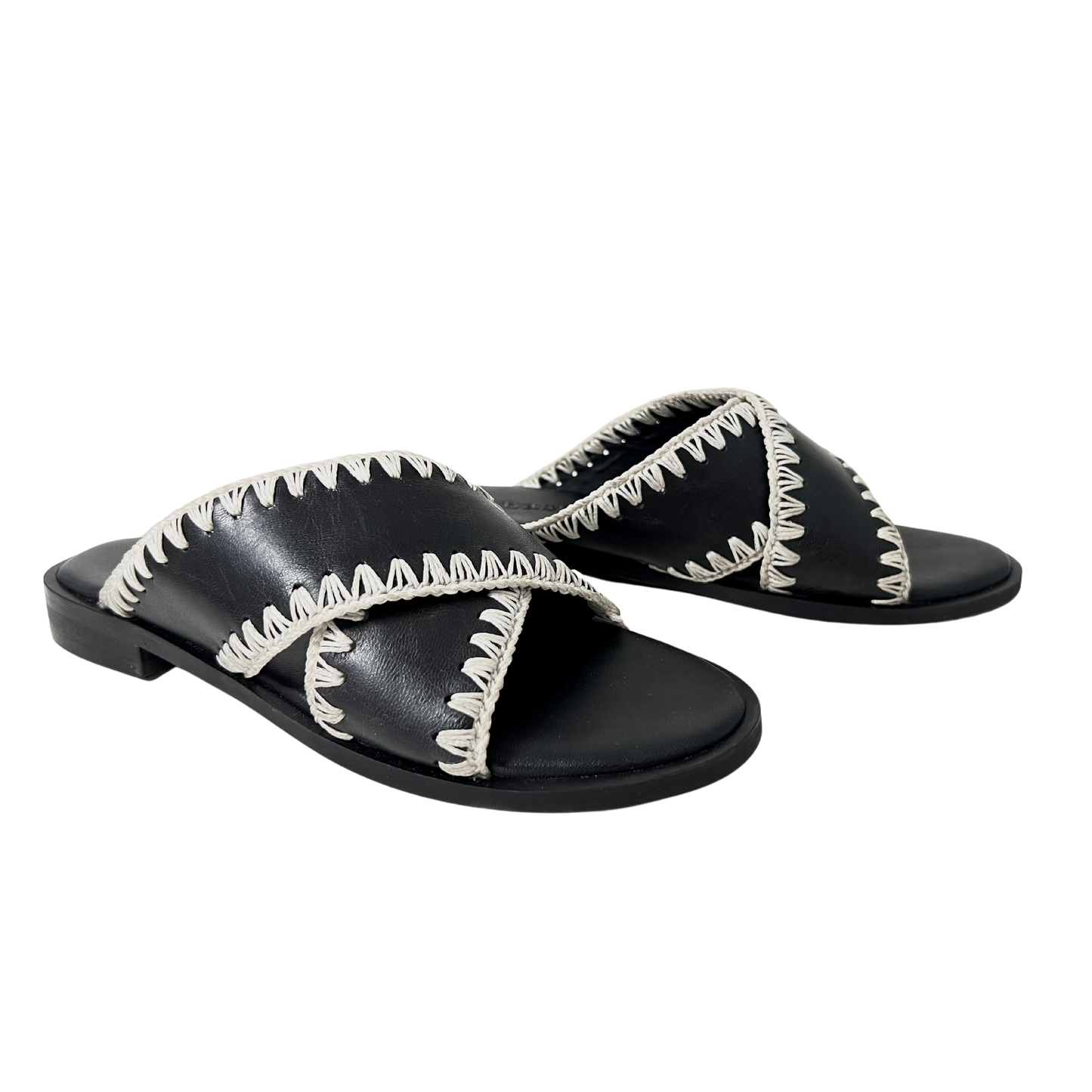 handweaved thread on a classic crossover strap ladies sandal in black color