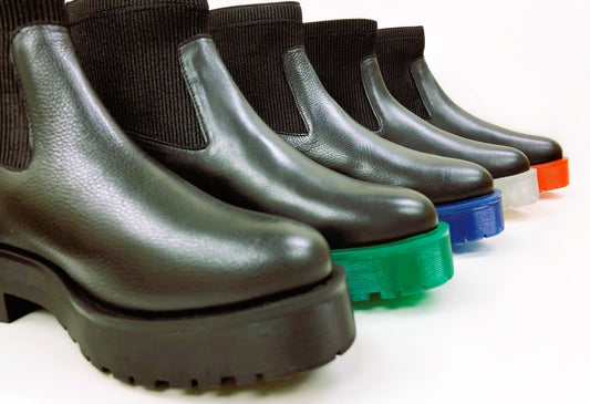 Black chelsea boot with colorful outsoles